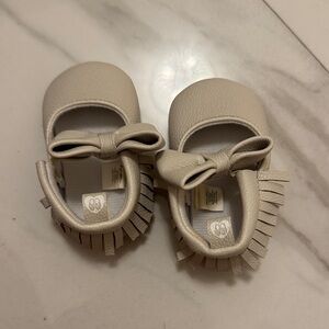 Adorable Cream Moccasins with Fringe and Bow